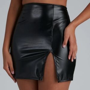 Black mini skirt with a slit on the side
